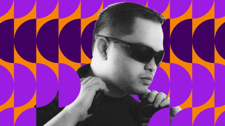 Avery Usita wearing sunglasses while DJing