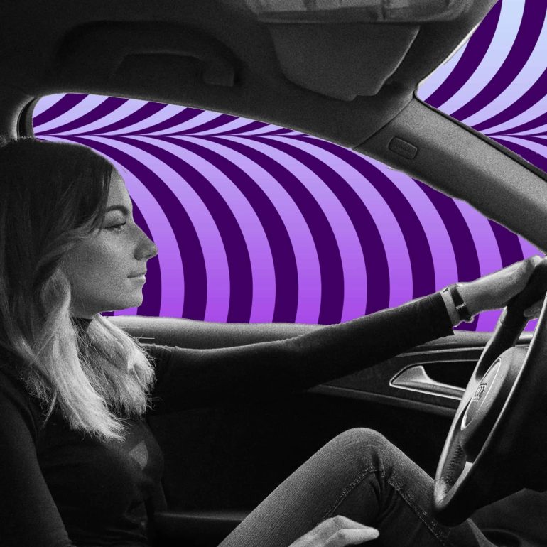 Woman driving car while listening to Drive @ 5