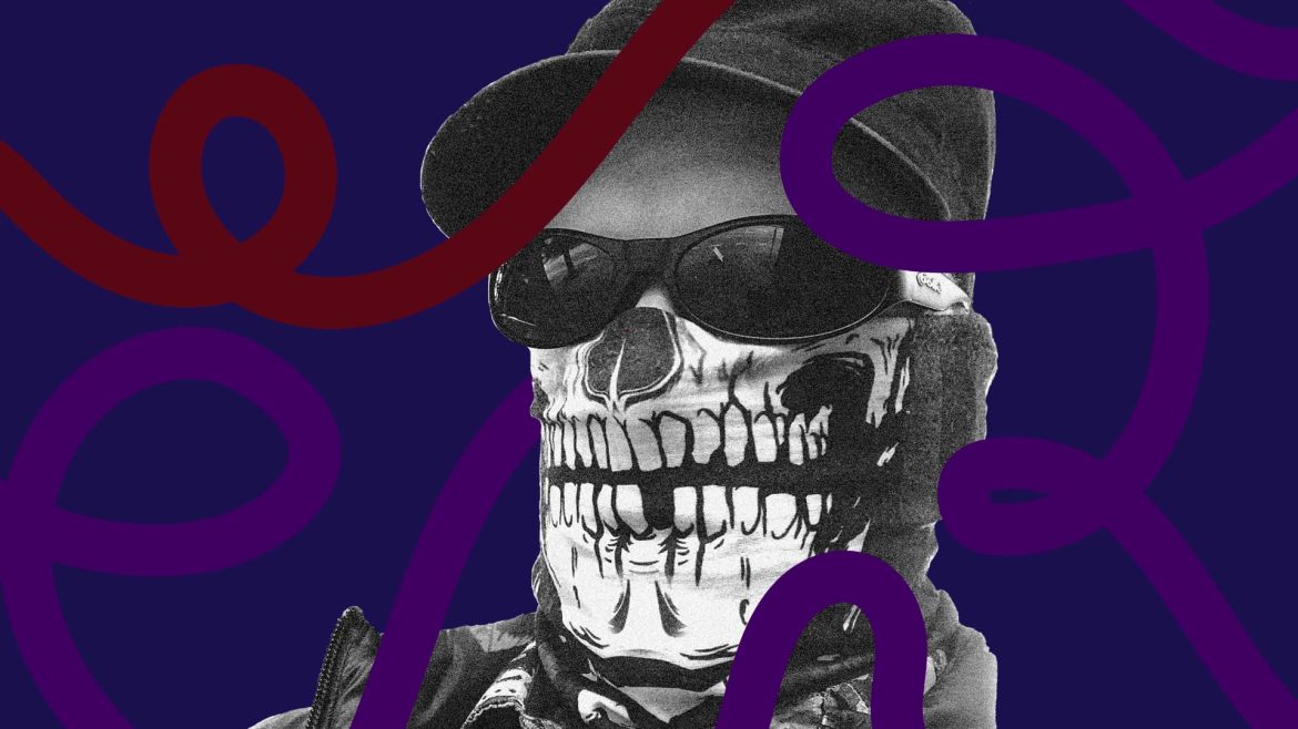 DJ Paradigm Lost headshot, wearing baseball cap, sunglasses, and skull mask