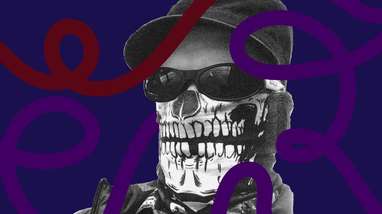 DJ Paradigm Lost headshot, wearing baseball cap, sunglasses, and skull mask